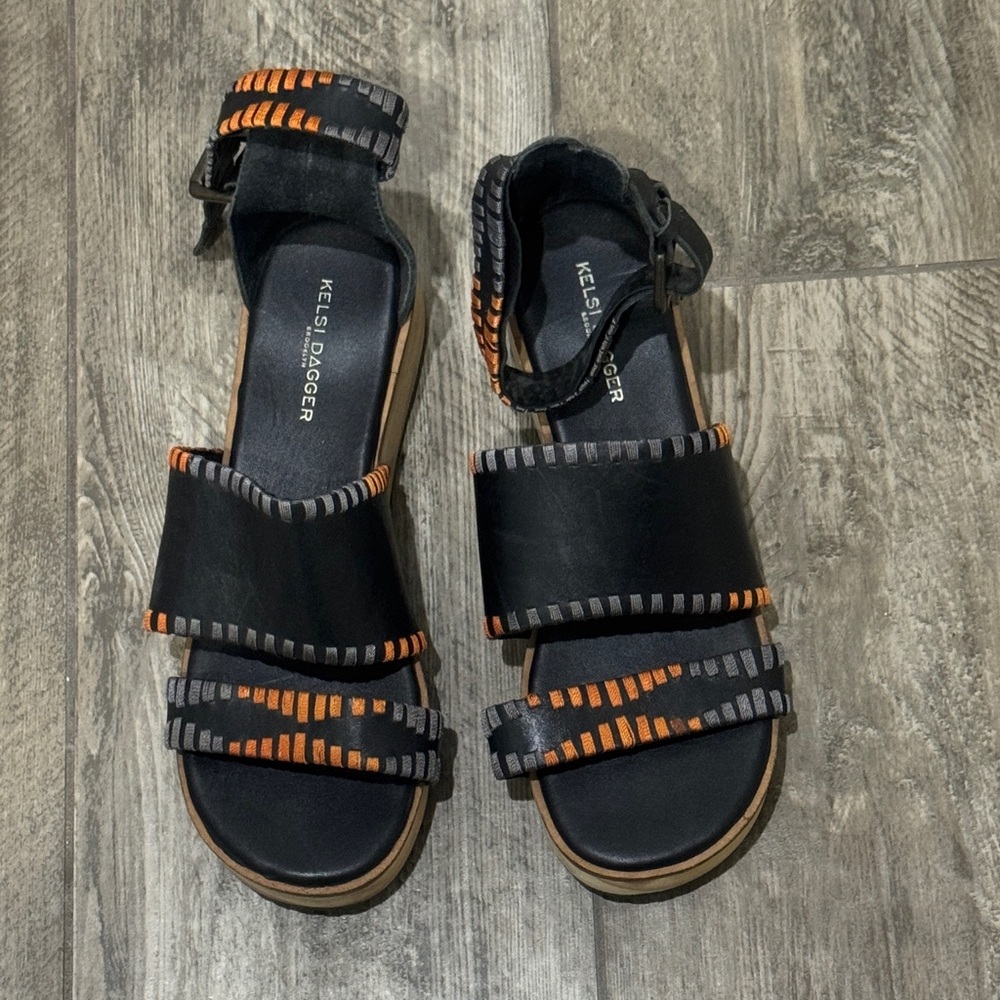 Kelsi Dagger Black Sandals with Orange and Gray Stitching
